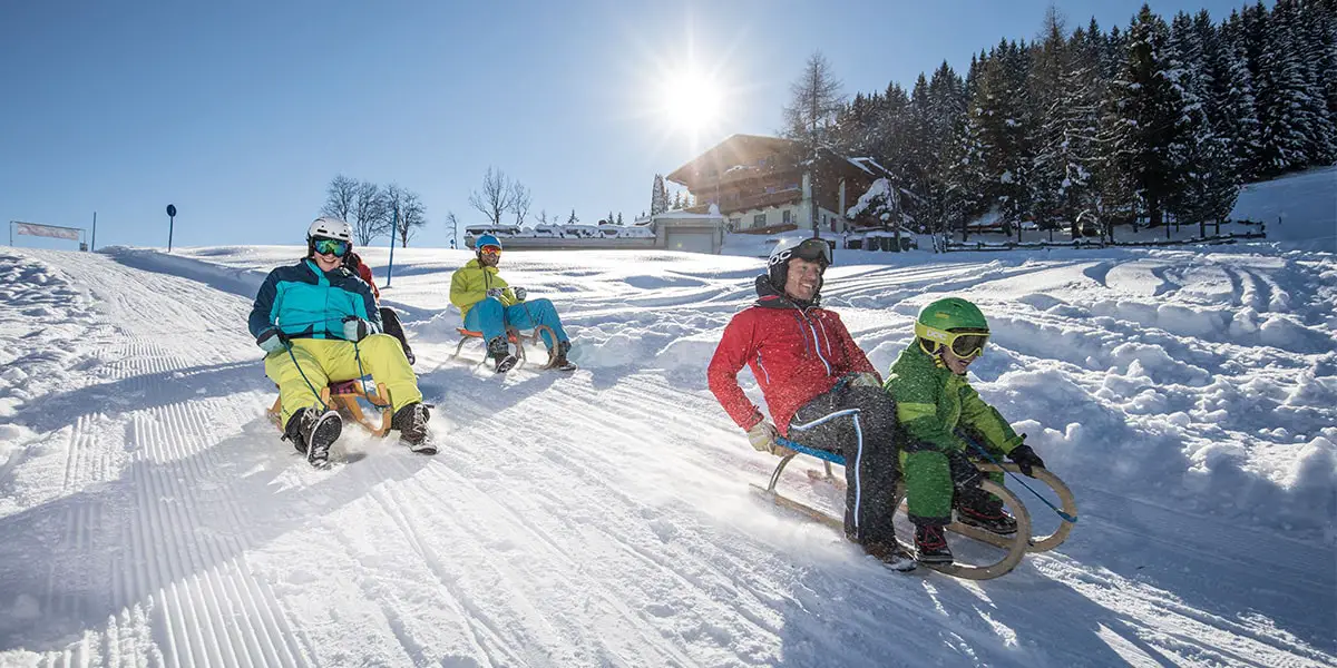 3_rodelgaudi_familie_schatzberg©Ski Juwel Alpbachtal Wildschoenau-min