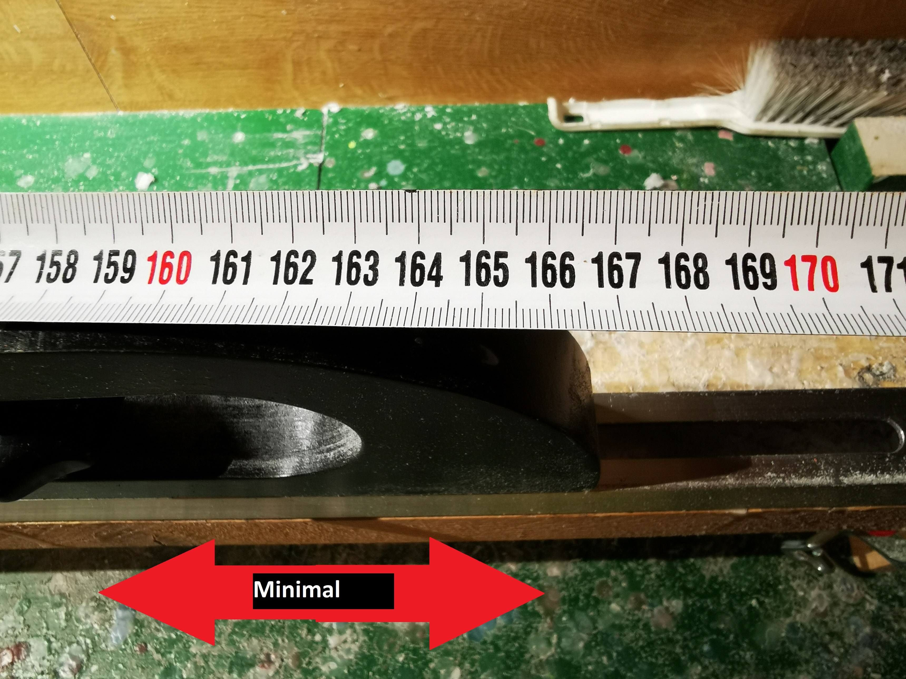 Minimale Länge verstellbar durch Langloch
