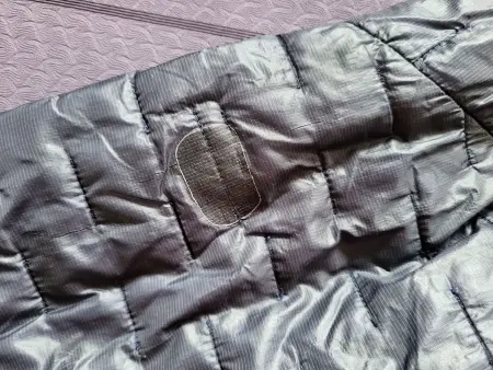 Geflickte Stelle der Jacke